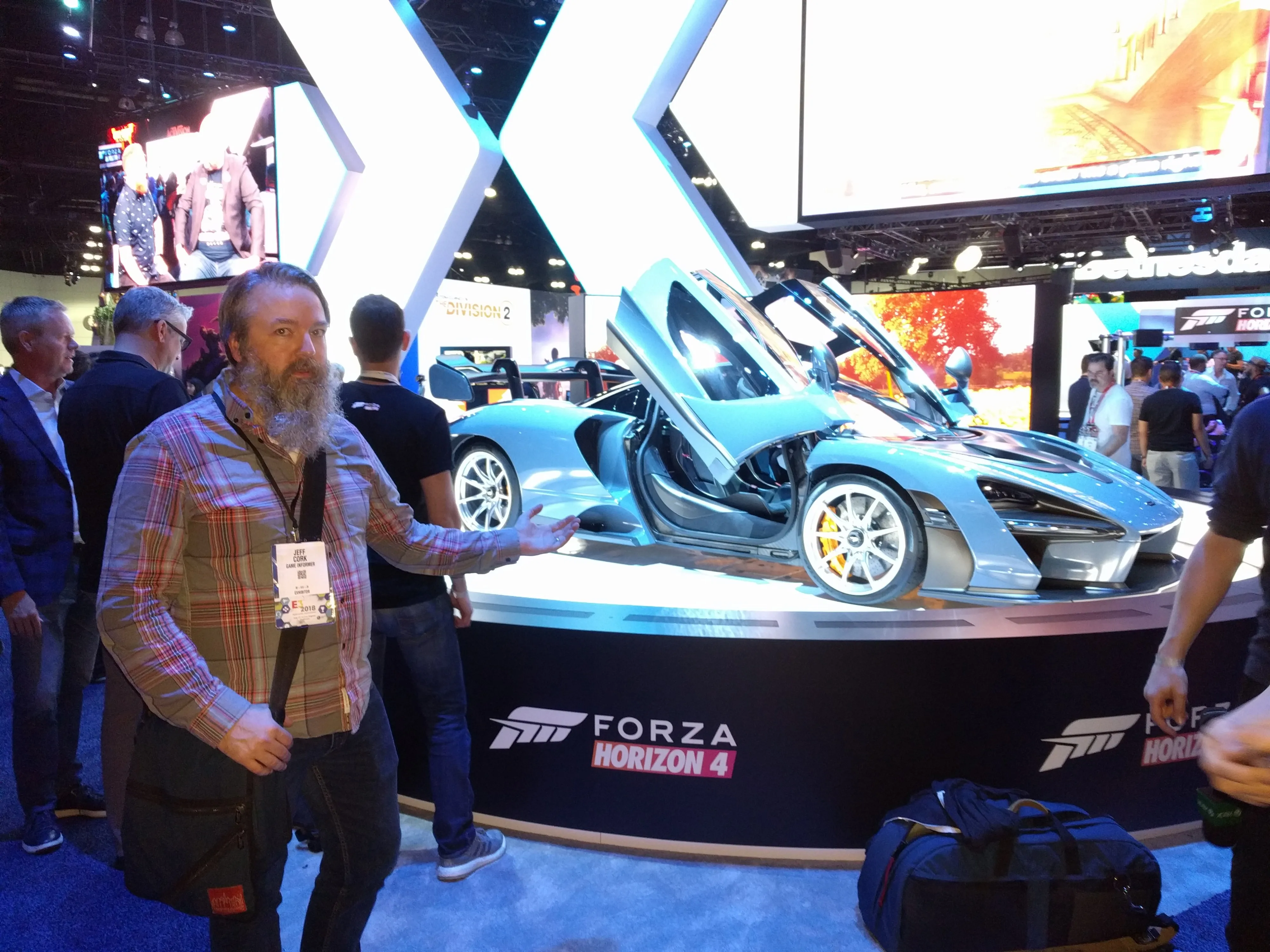 Hey, we found the missing sports car that was supposed to bring Microsoft's press conference to a crawl! Here's Jeff Cork presenting it with just the right amount of enthusiasm.