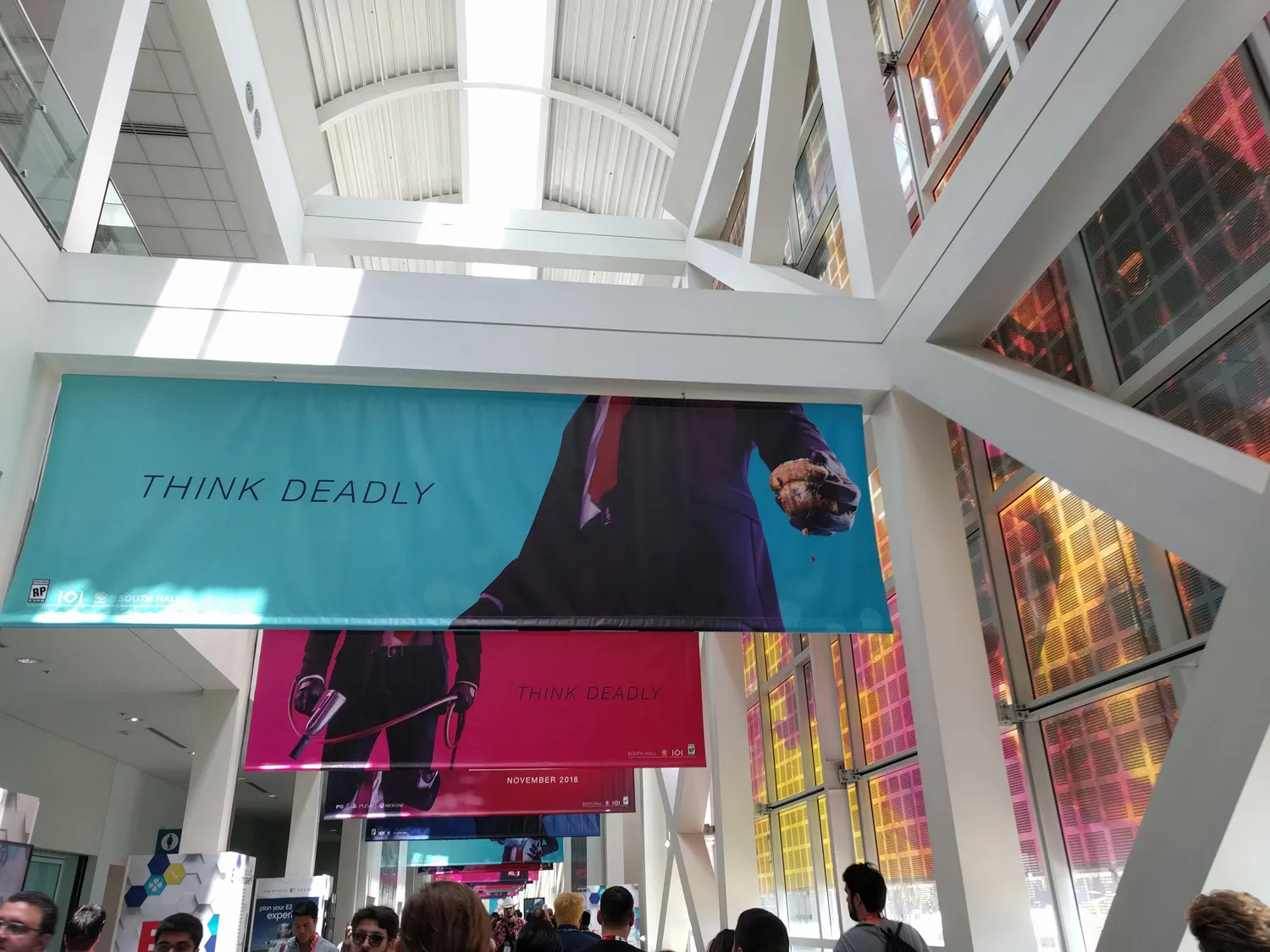 Hitman 2 has a long line of banners running down the main hallway. How the heck is 47 going to kill someone with that muffin?!