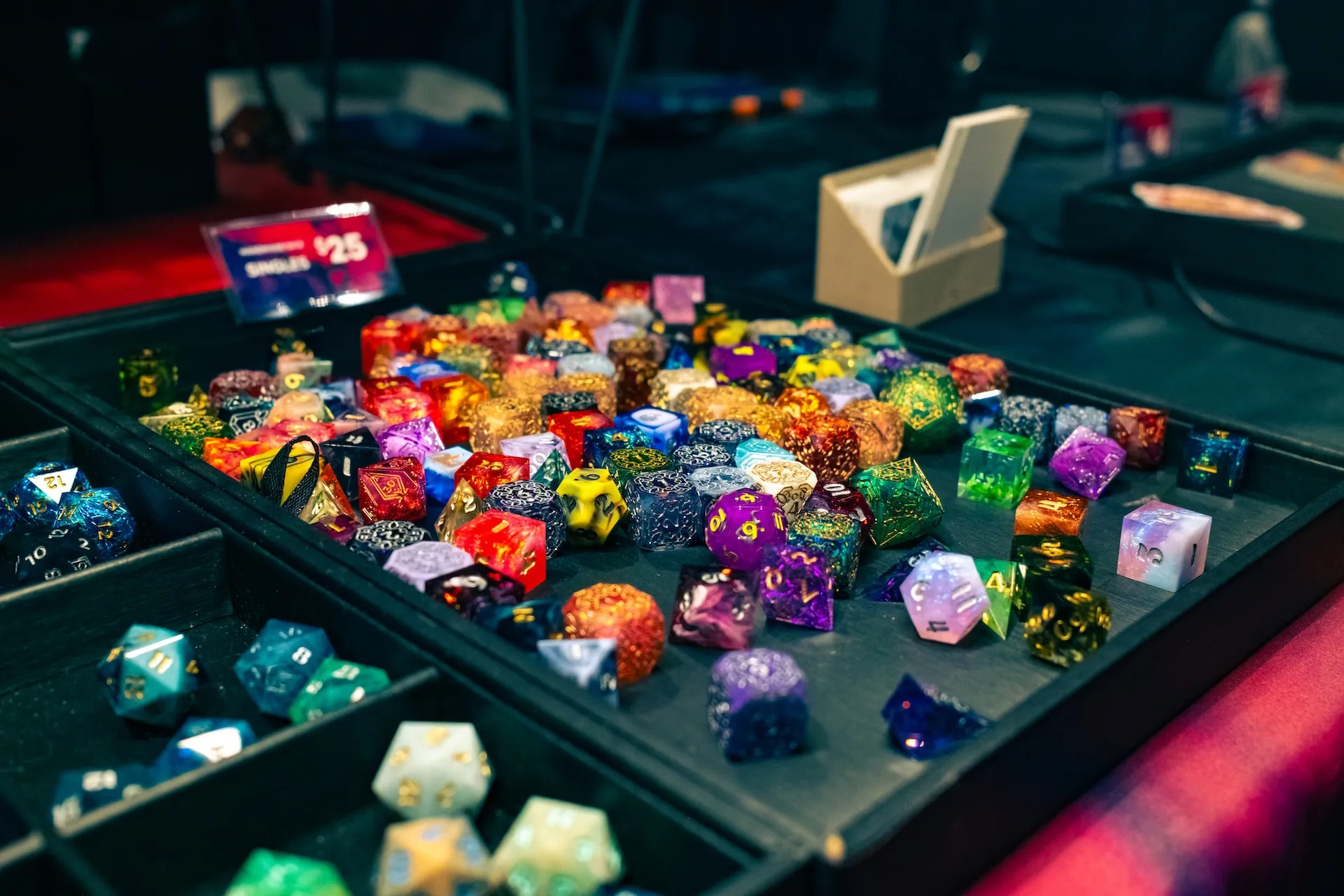 Yaniir dice and jewelry booth at PAX East 2025