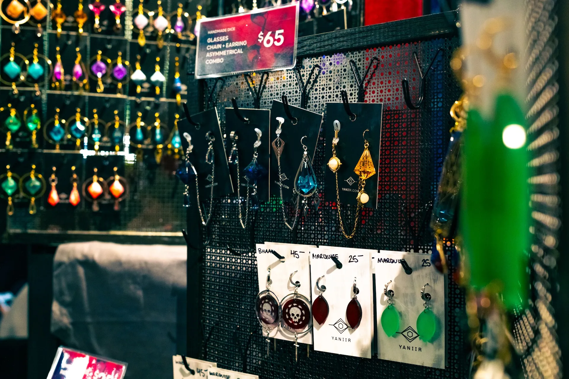 Yaniir dice and jewelry booth at PAX East 2025